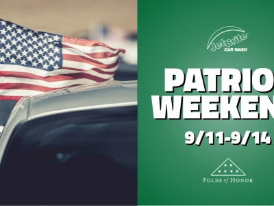 Shining car with American flag waving. Text reads "Patriot Weekend 9/11-9/14" featuring the Folds of Honor and Jet Brite Car Wash logos.